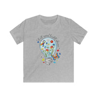 Kids Tee — “Let Your Light Shine” Lightbulb & Puzzle Heart Autism Awareness School Shirt